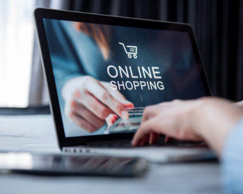 e-commerce-online-shopping-concept-woman-hand-using-laptop-mockup-website-holding-credit-card-shopping-payment-online-home Online Shopping